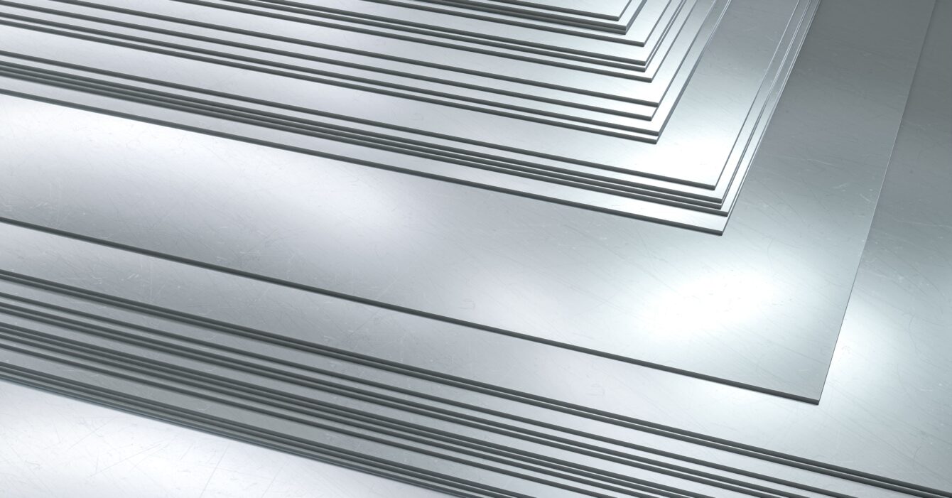 stacked-metal-sheets-metallurgical-industry-3d-render-min stacked-metal-sheets-metallurgical-industry-3d-render-min